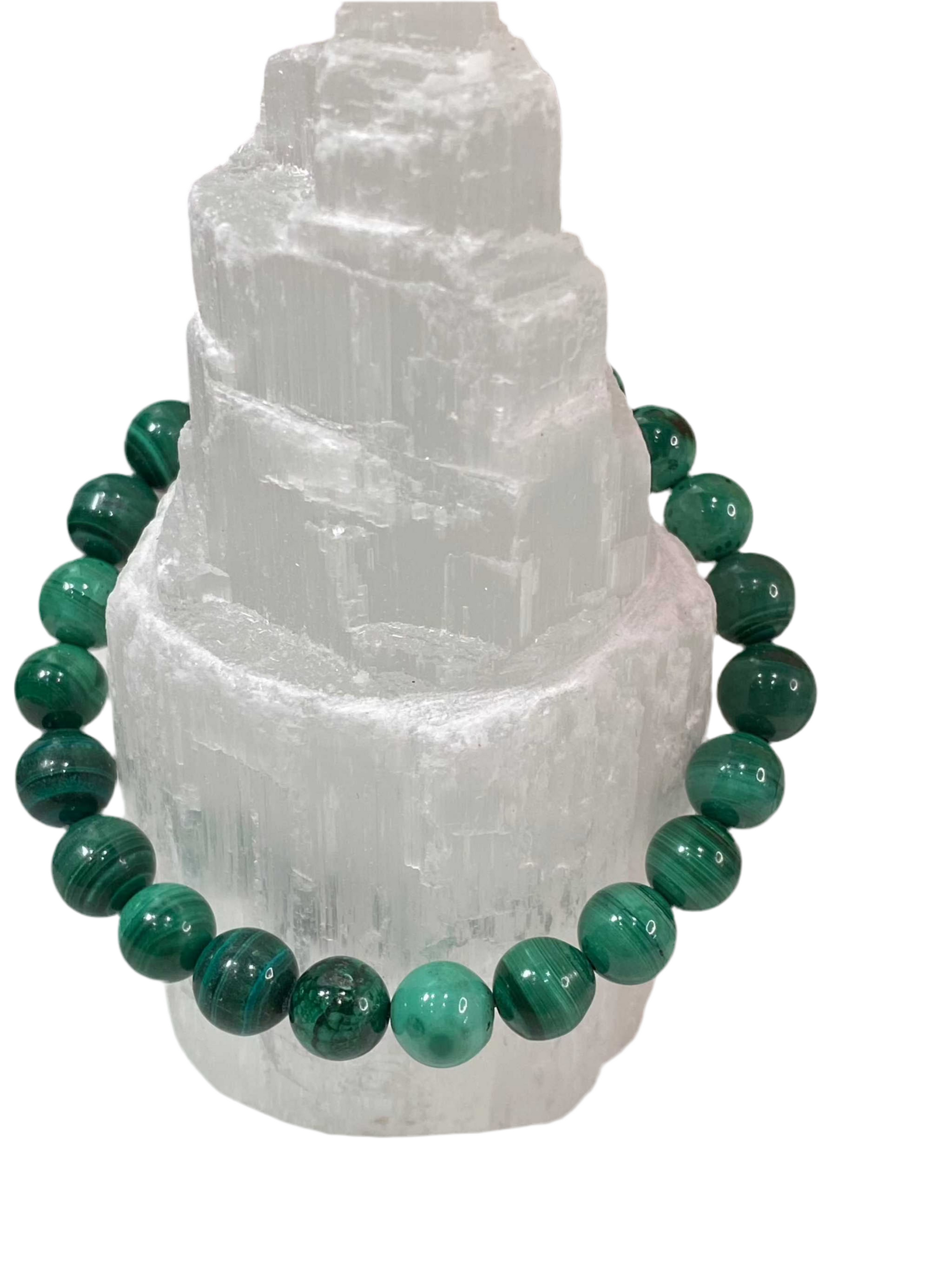 Malachite Bracelet with 8mm green beads displaying unique natural patterns.
