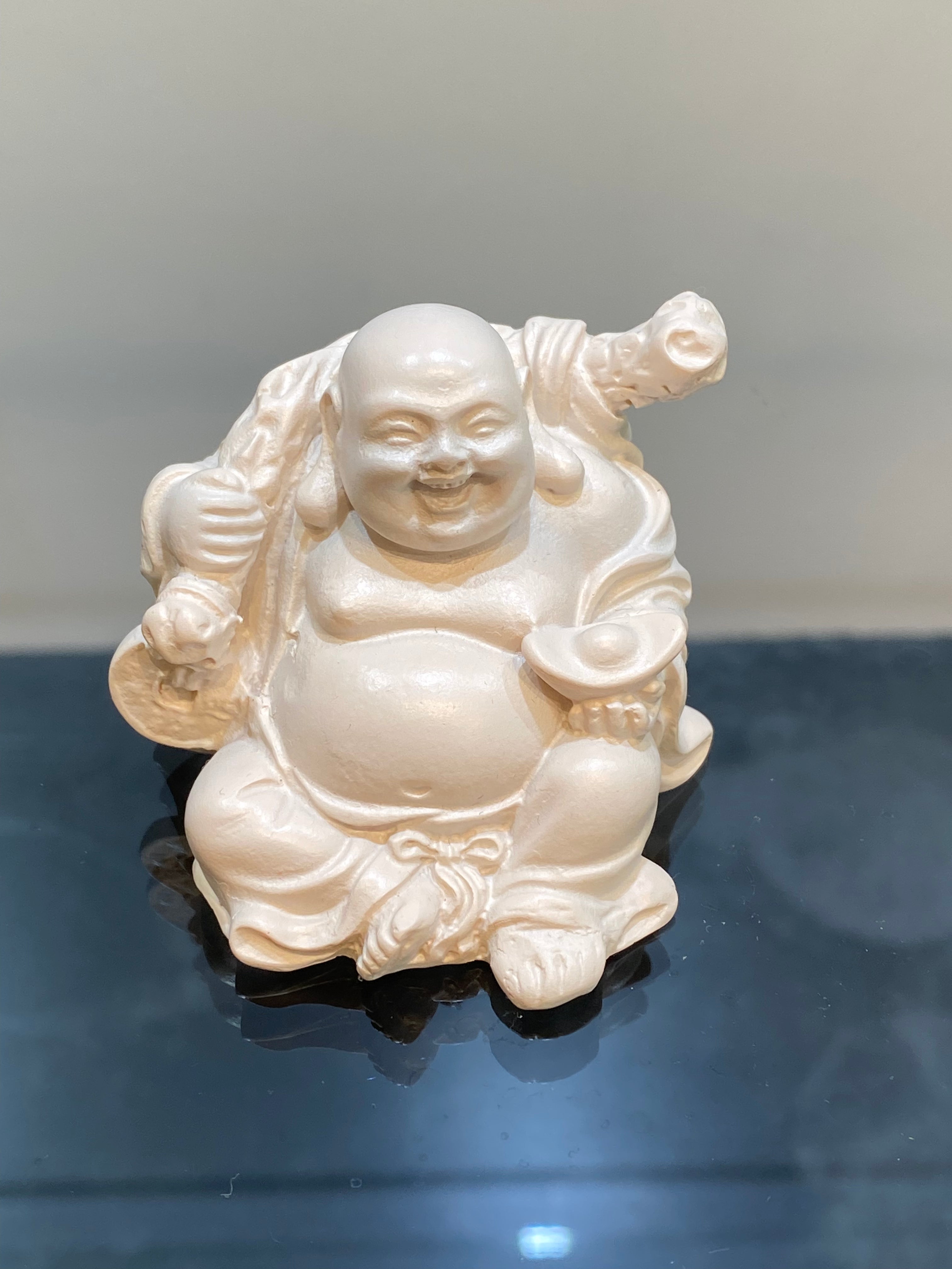 Ivory Laughing Sitting Buddha holding his Ingot and bag of plenty ...