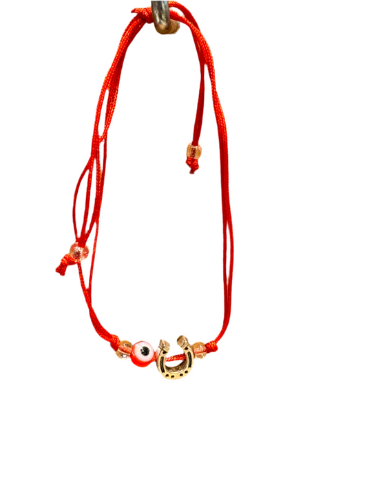 Red String Pull Tie Bracelet With Horseshoe Charm and Evil Eye Bead