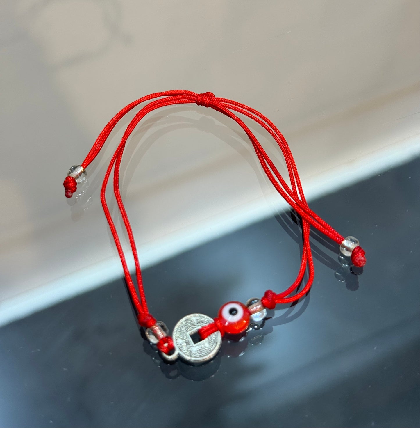 Handmade Red String Pull Tie Bracelet Silver Chinese Coin and Red Evil Eye Bead