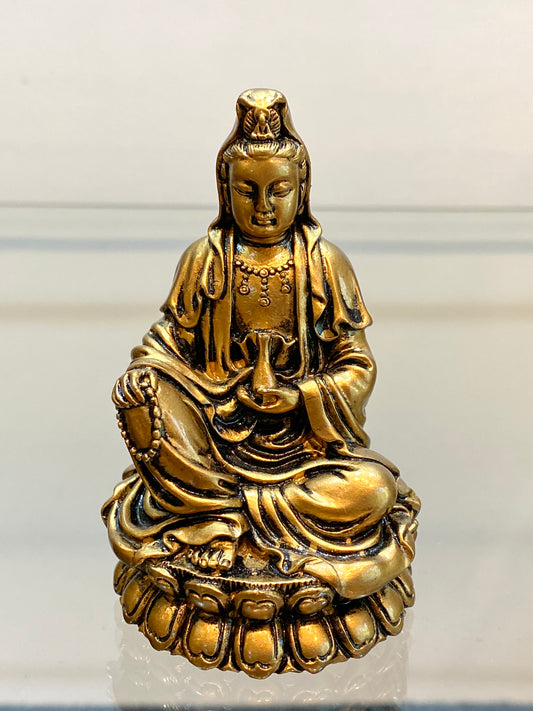 Gold Kwan Yin Figurine, Goddess of mercy and compassion seated on a Lotus Flower