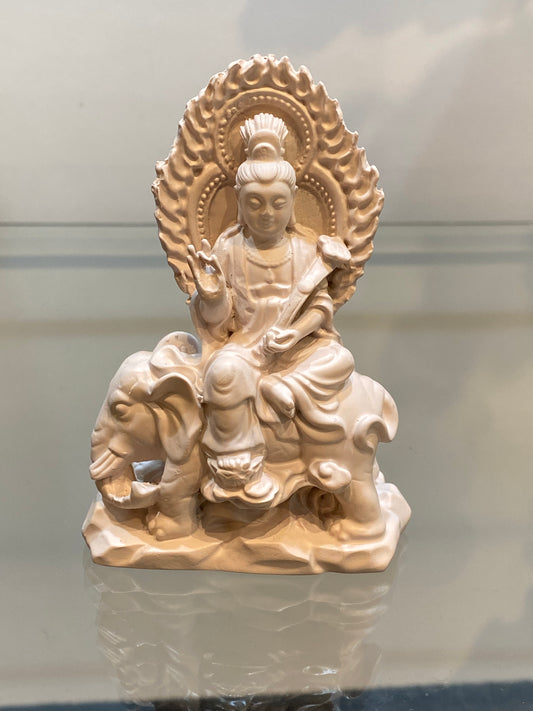 Ivory Gypsum Kuan Yin seated on an Elephant Throne