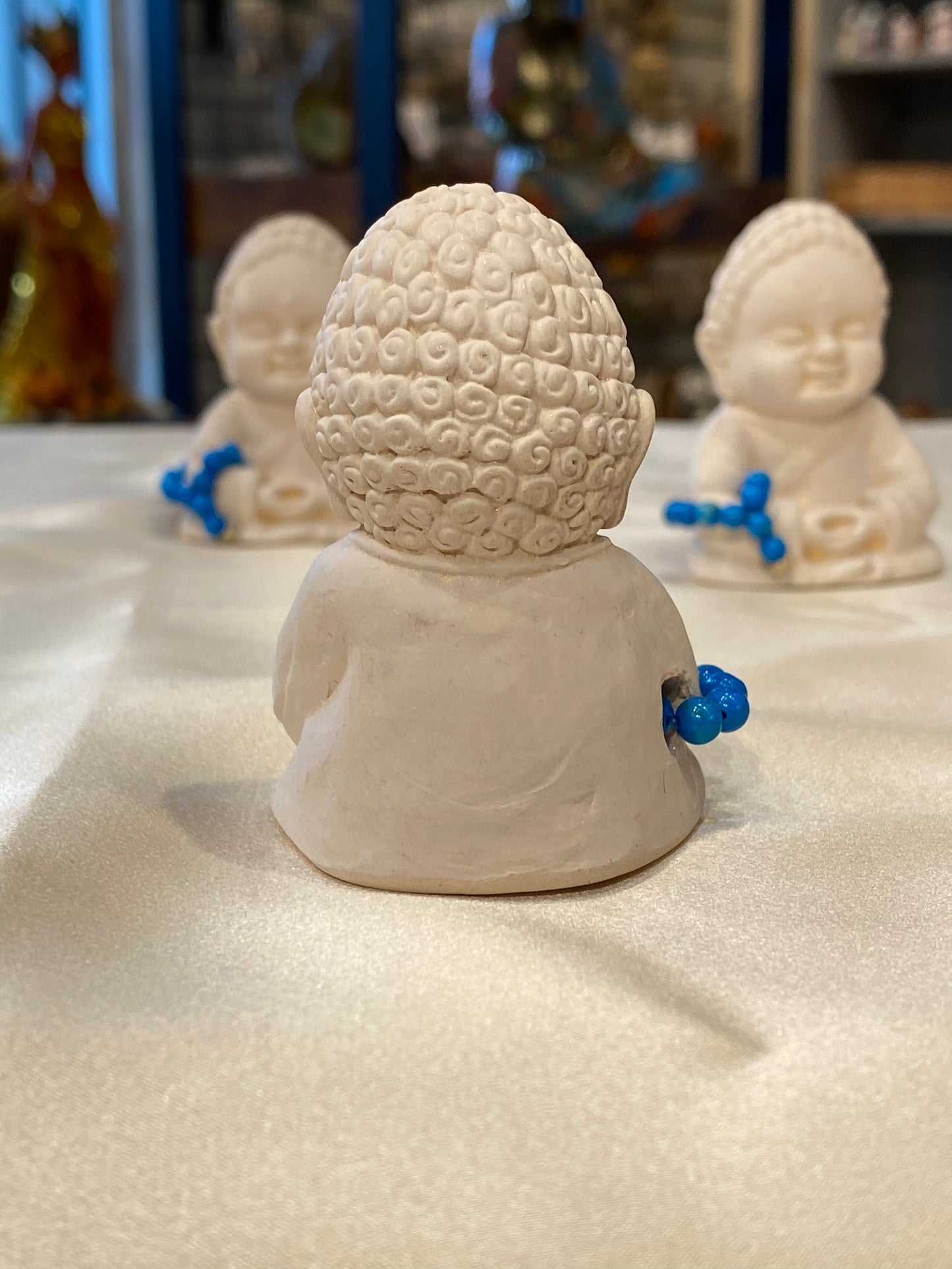 Ivory Miniature Meditation Buddha holding Bead