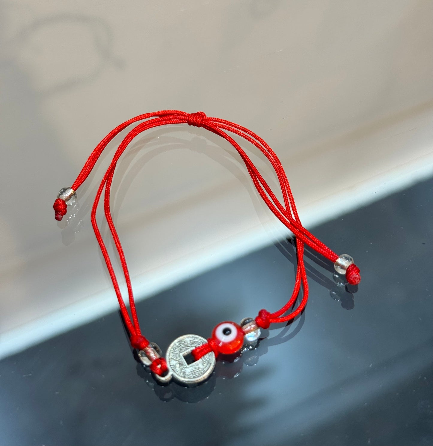 Handmade Red String Pull Tie Bracelet Silver Chinese Coin and Red Evil Eye Bead