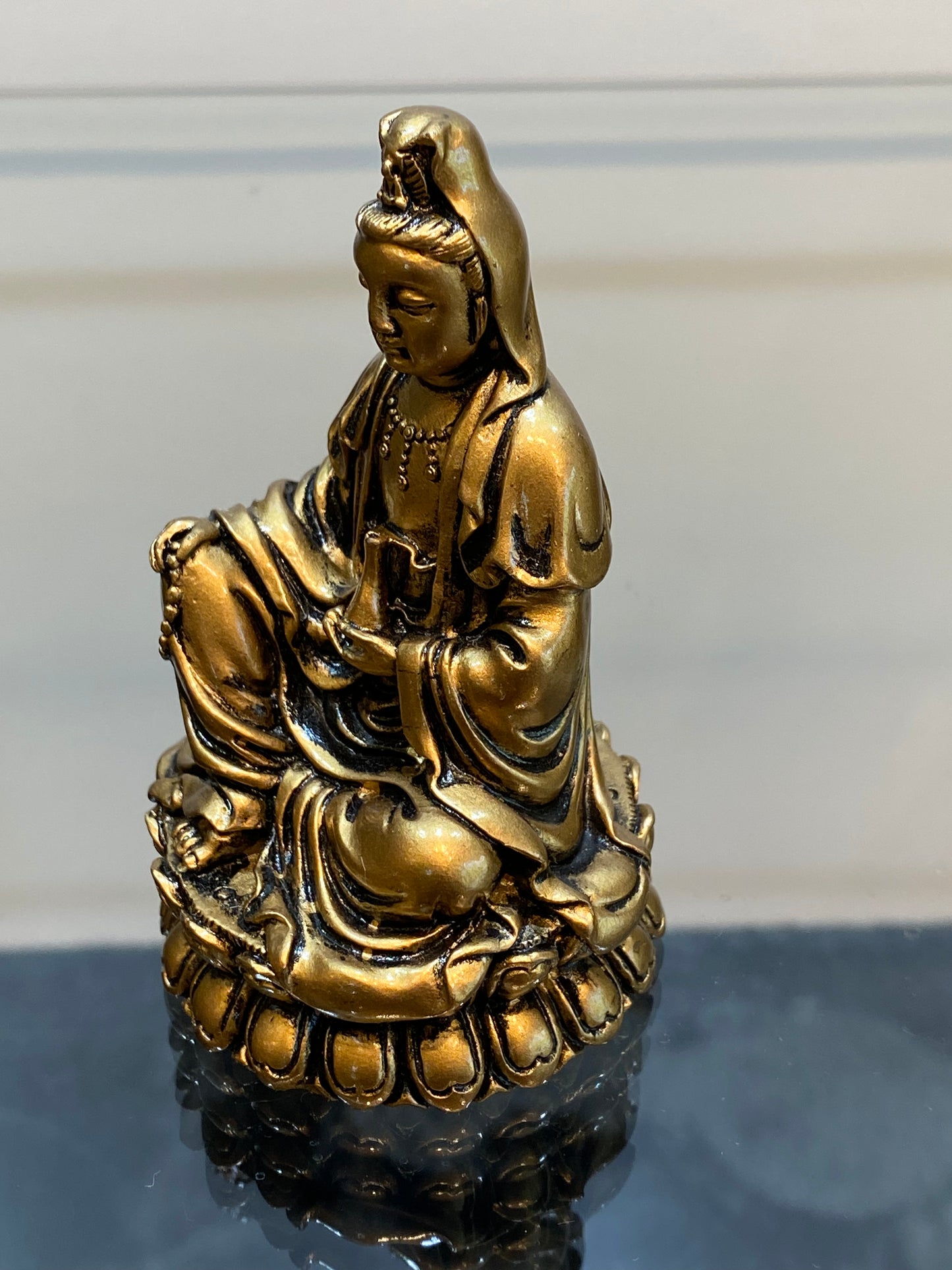 Gold Kwan Yin Figurine, Goddess of mercy and compassion seated on a Lotus Flower