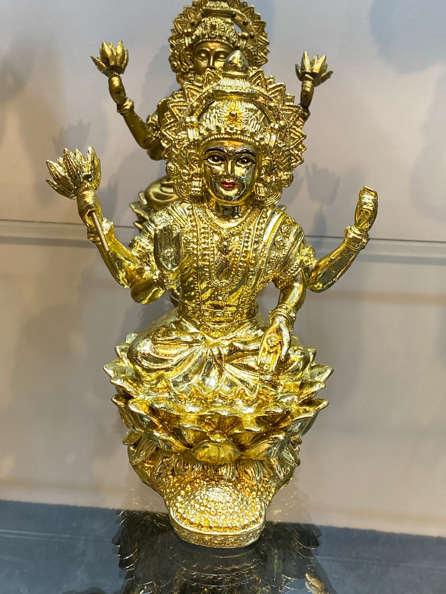Goddess Lakshmi on Lotus Raining Gold Coins Bright Golden Color