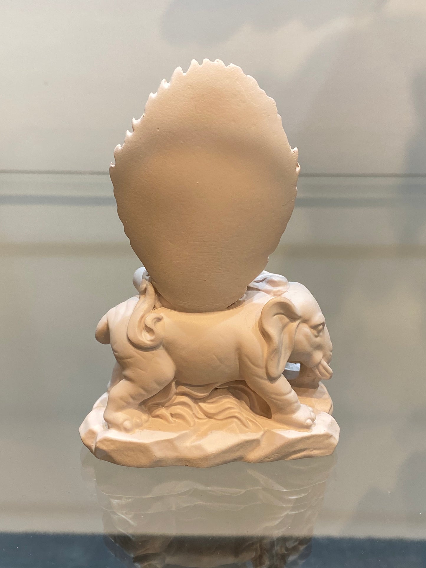 Ivory Gypsum Kuan Yin seated on an Elephant Throne