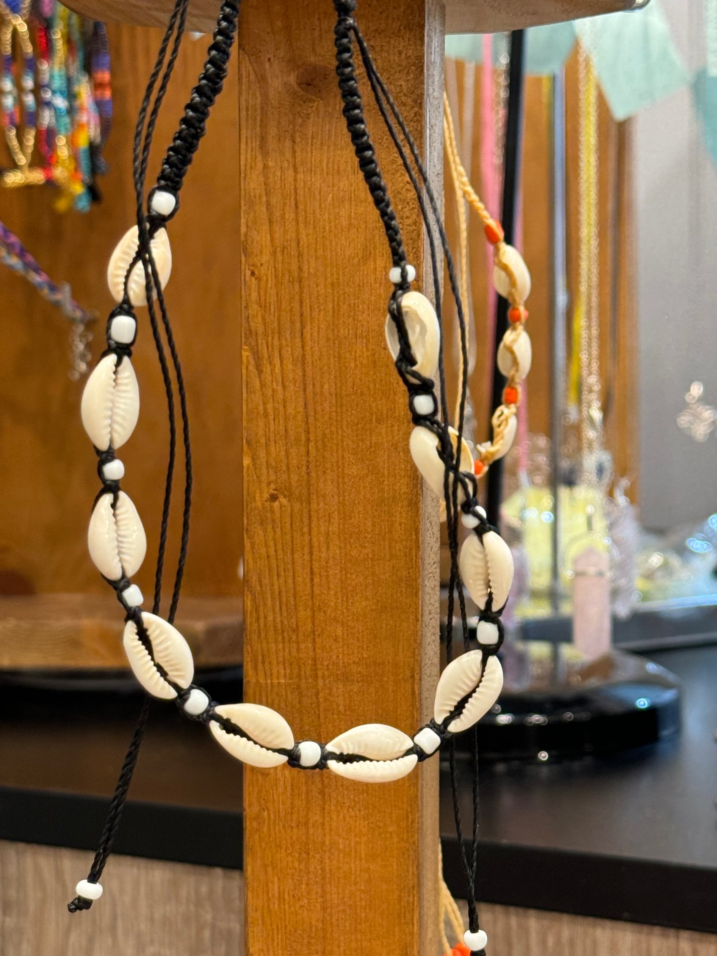 Handmade Cowrie Natural Shell String Pull Tie Choker Necklace White Beads On A Black Necklace