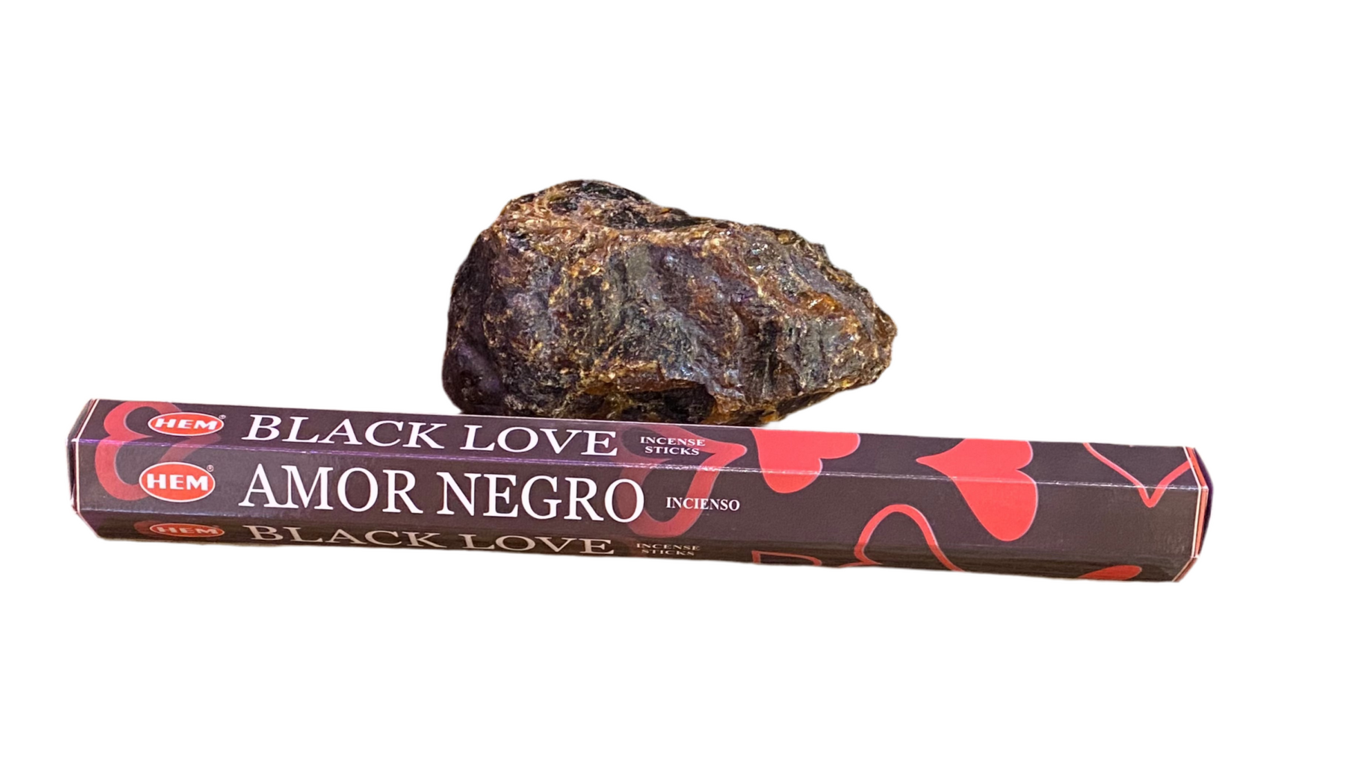 HEM Black Love Incense sticks with rock backdrop.