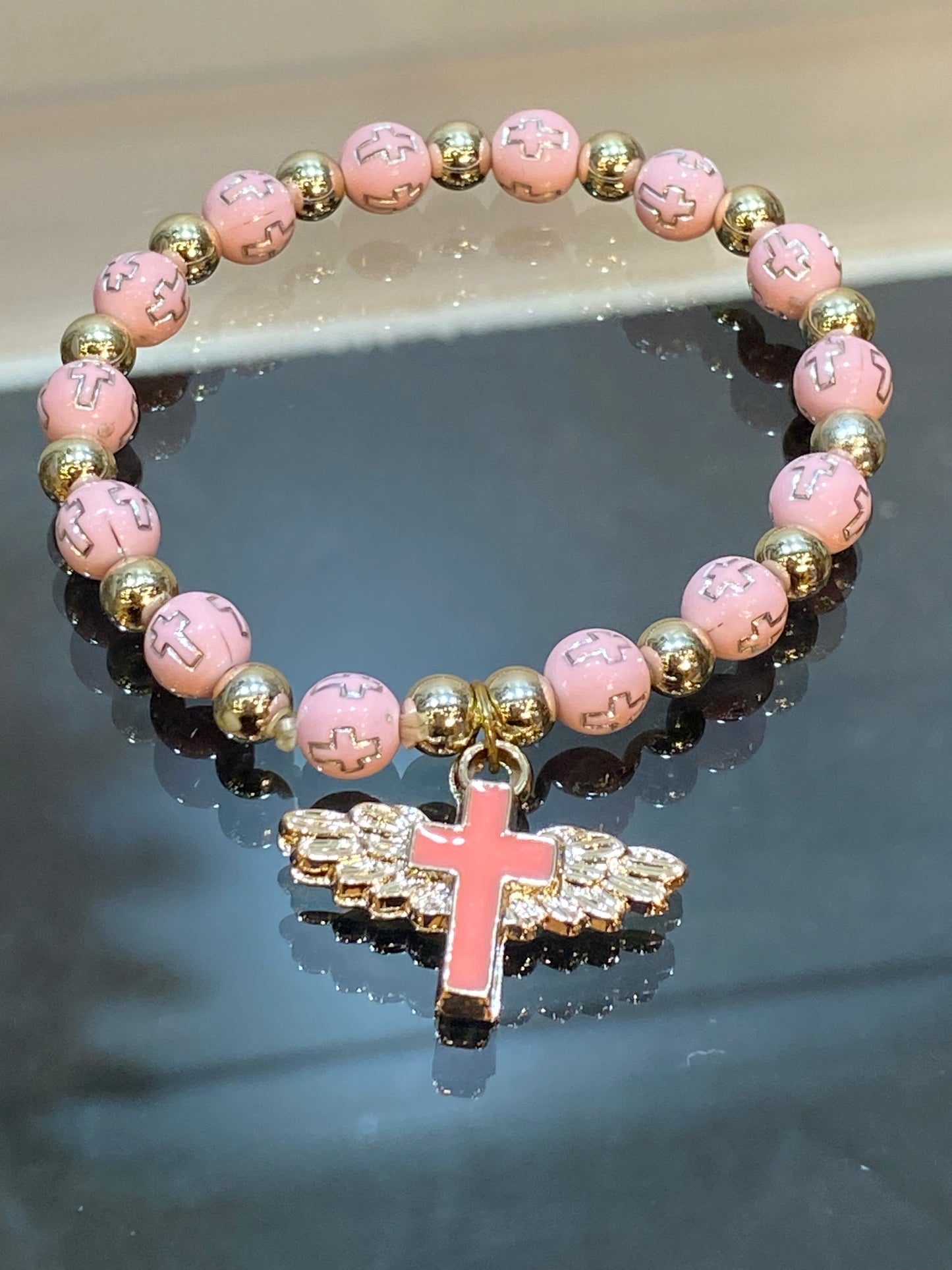 Pink and Silver Engraved Cross Beaded Stretch Bracelet With Hanging Cross Angel Wings Charm