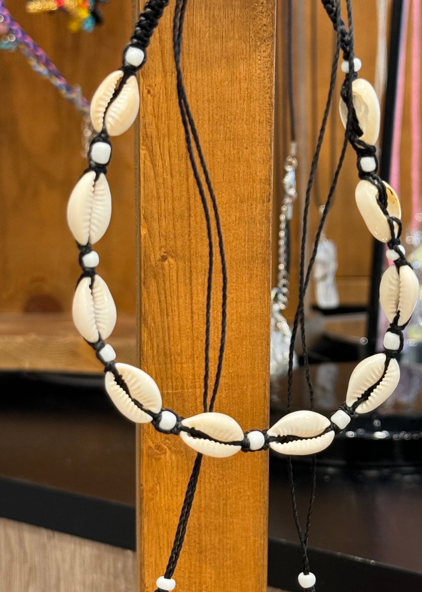 Handmade Cowrie Natural Shell String Pull Tie Choker Necklace White Beads On A Black Necklace