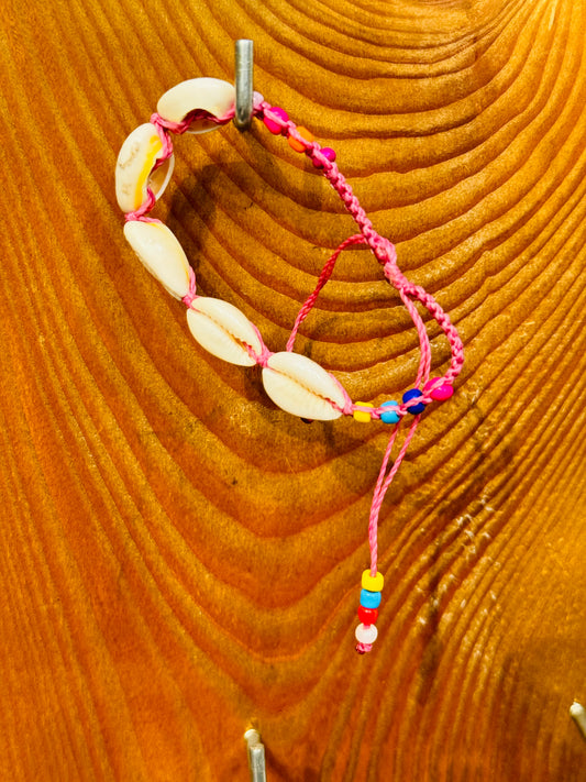 Handmade Pink String Bracelet With Cowrie Shells and Colorful Beads. Bright, joyful, and filled with ocean energy.