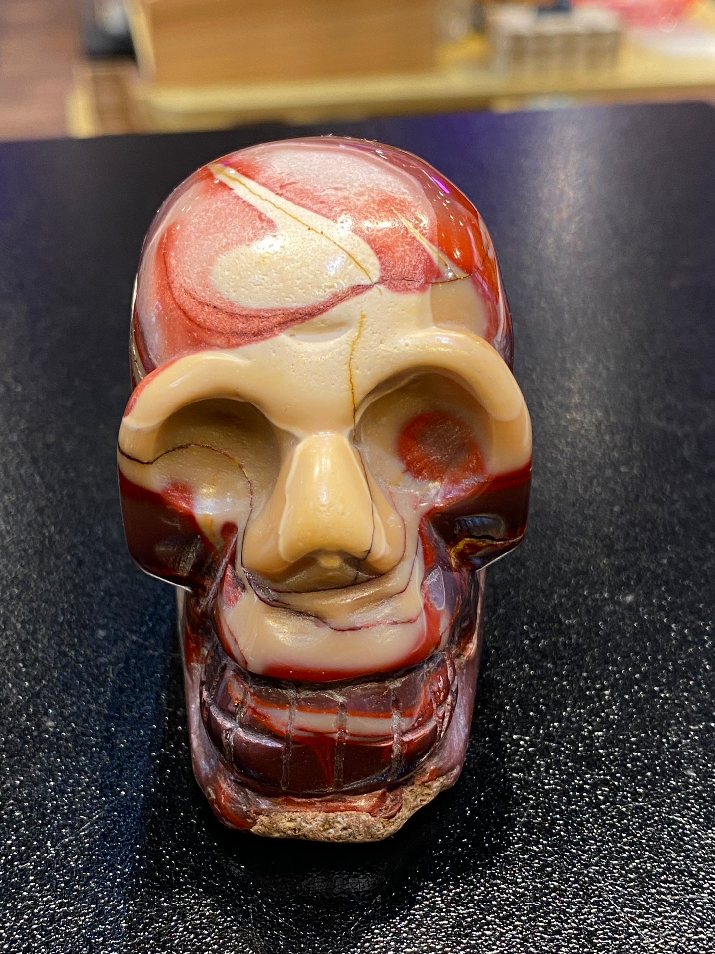 Polished Natural Hand Carved Mookaite Jasper Skull