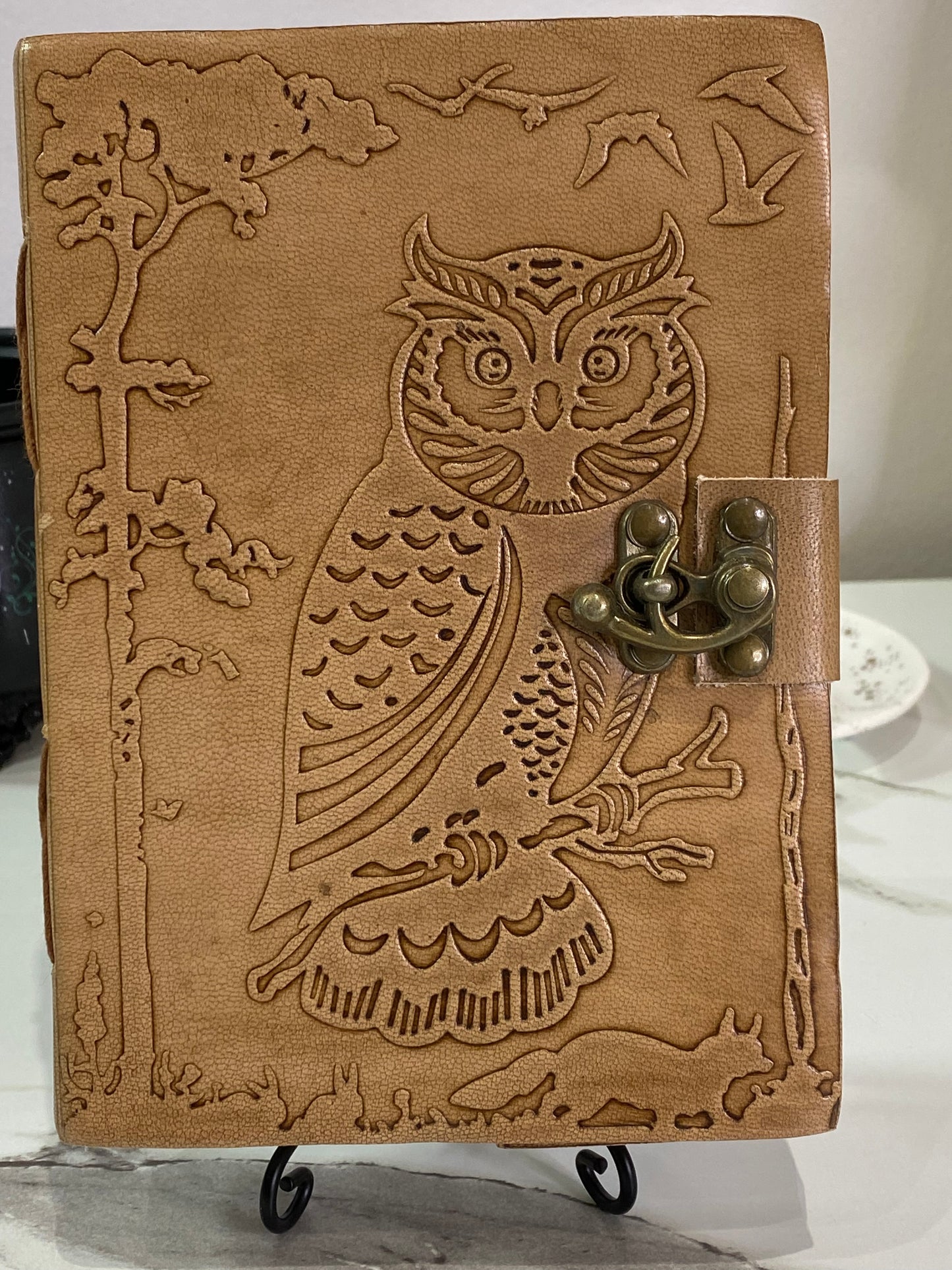 Handmade leather journal with owl embossing and latch closure, 5" x 7".