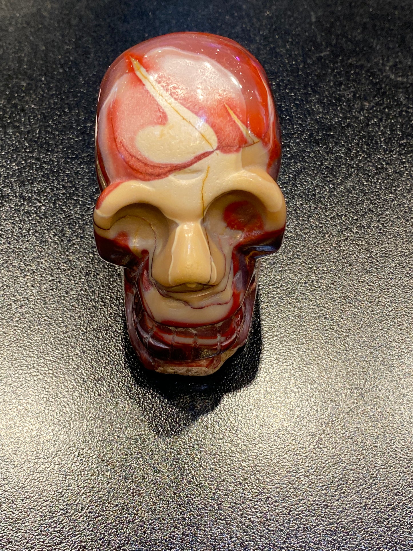 Polished Natural Hand Carved Mookaite Jasper Skull